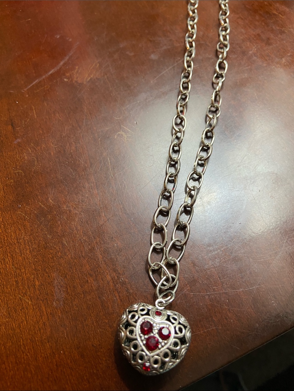 Silver Heart Pendant Necklace with Red Gem Accents